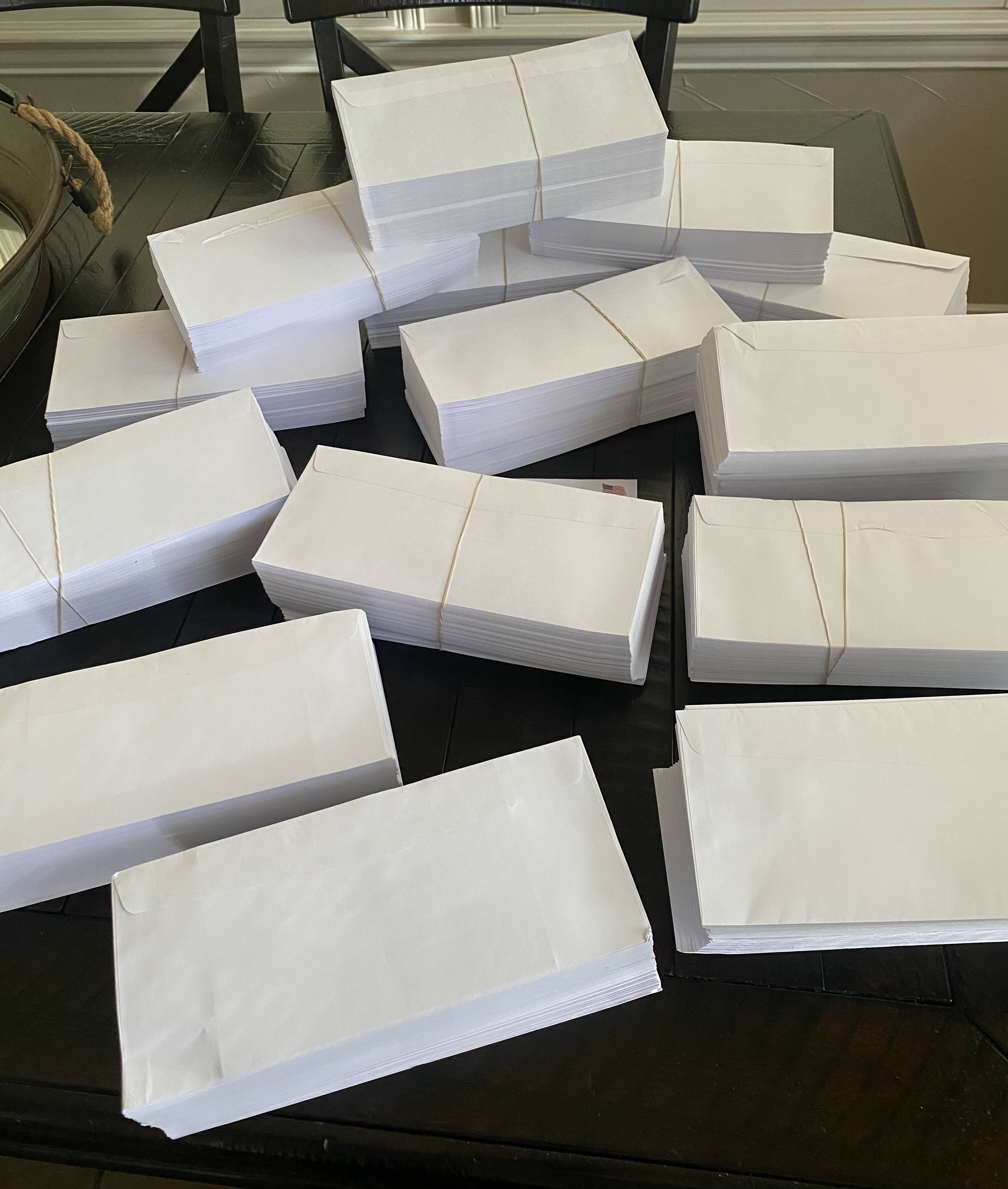 Stacks of envelopes sorted and ready